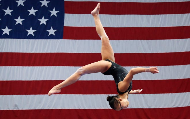 Morgan Hurd practices on the balance beam during a training session at the U.S. Gymnastics Championships, Wednesday, Aug. 15, 2018, in Boston. The mandate to change the culture within USA Gymnastics will take years. Yet there are small signs at the U.S. Championships that the process has already begun under new high performance director Tom Forster, from quiet chats during the middle of meets to impromptu phone calls of encouragement. (AP Photo/Elise Amendola, File)