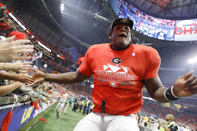 Georgia offensive lineman Isaiah Wilson has been working with Georgia's first-team offense at right tackle for much of preseason camp as the Bulldogs attempt to replace Isaiah Wynn, who was the starting left tackle last season. [David Goldman/The Associated Press]