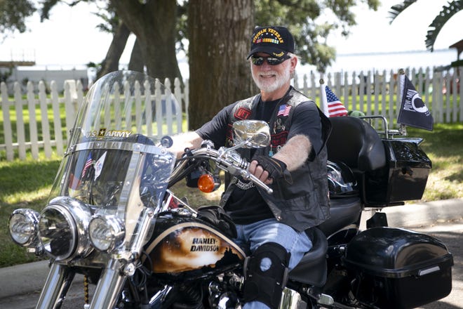 Retired mustang Lt. Col. Lynn Richard "Rich" Cox, 71, enjoys long rides on his 2006 Harley Limited Military Edition. [Cindy Sharp/Correspondent]