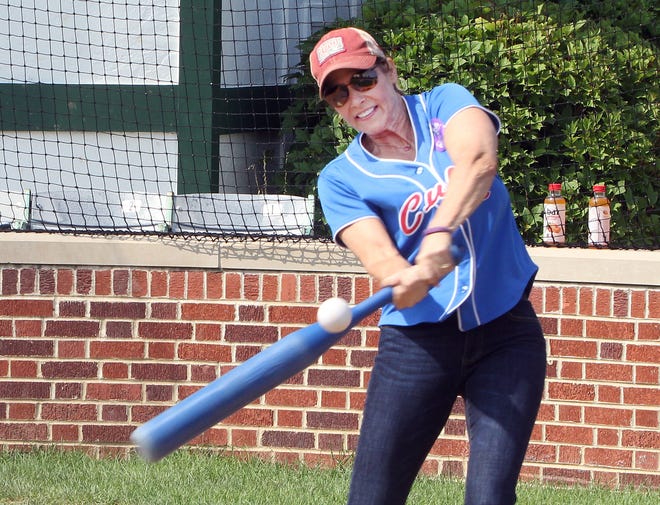 U.S. Rep. Cheri Bustos connects during the Home Run Derby on Saturday, Aug. 18, 2018, at Little Cubs Field in Freeport. [JANE LETHLEAN/THE JOURNAL-STANDARD CORRESPONDENT]