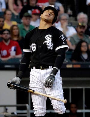 Chicago White Sox's Avisail Garcia reacts after striking out on a foul tip during the fourth inning against the Kansas City Royals, Saturday, Aug. 18, 2018, in Chicago. [NAM Y. HUH/THE ASSOCIATED PRESS]