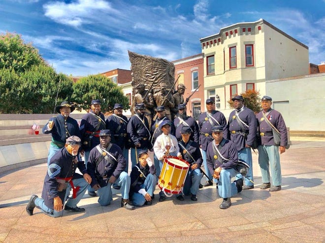 Members of Tryon Palace's United States Colored Troops 35th Regiment recently visited the African-American Civil War Museum in Washington, D.C. During the trip, the group marched and showed off various routines as well as participated in a parade walk. For more information about the USCT, call 252-639-3500 or visit www.tryonpalace.org. [CONTRIBUTED PHOTO]
