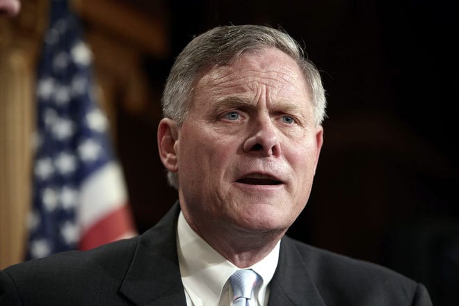 In this March 29, 2017 file photo, Senate Intelligence Committee Chairman Sen. Richard Burr, R-N.C. speaks to reporters about his panel's investigation of Russian interference in the 2016 election, on Capitol Hill in Washington. In an exclusive interview with The Associated Press, the North Carolina Republican opened up about the investigation that has now consumed 19 months of his life. [J. SCOTT APPLEWHITE/ASSOCIATED PRESS]