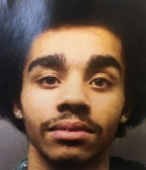 Tyree Catledge, 22, of Erie, seen in this Erie Bureau of Police photo, is one of four people charged by city police in a burglary at an East 30th Street residence where two people died during a storm in November. [CONTRIBUTED PHOTO]