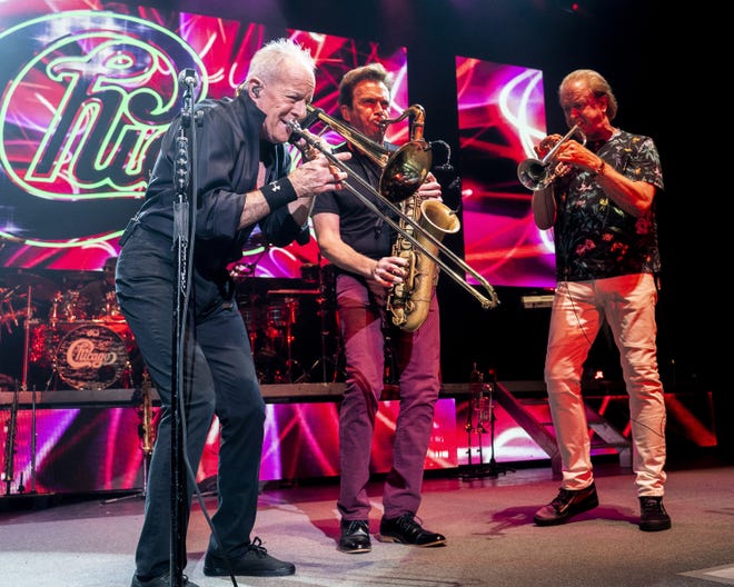 The American iconic rock band Chicago with trombone player James Pankow, saxophone player Ray Herrmann and trumpet player Lee Loughnane performs at the Xfinity Center, Sunday, Aug. 5, 2018, in Mansfield, Mass.. (Photo by Robert E. Klein/Invision/AP)
