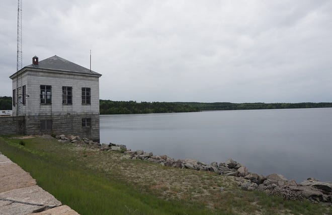 Scituate Reservoir as seen from Route 12. In 1915, the City of Providence persuaded the General Assembly to let it build a reservoir in Scituate to solve its water-supply problem. In doing so, the Assembly outlined in broad terms what cities and towns that bought Providence water could do with it. [The Providence Journal / Sandor Bodo]