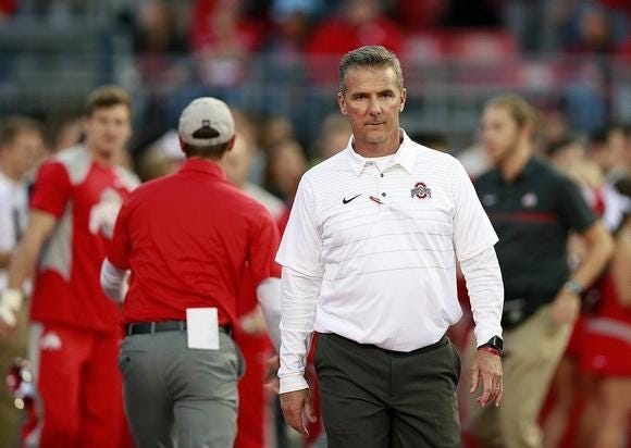 GateHouse Media Ohio Brooke LaValley/Dispatch

Ohio State University head football coach Urban Meyer leaves the field before a Sept. 2017 game against Oklahoma.