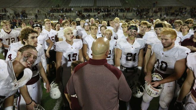 Dripping Springs head coach Galen Zimmerman speaks with his team after a 59-29 win over LBJ during a Class 5A, Division I bi-district playoff high school football game at Reeves Athletic Complex, Friday, Nov. 17, 2017. (Stephen Spillman / for American-Statesman)