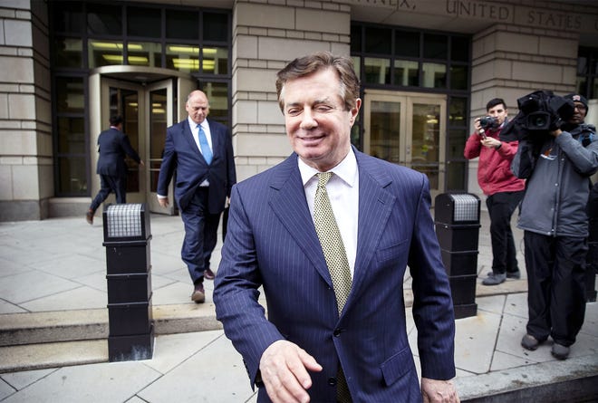 Paul Manafort, former campaign manager for Donald Trump, exits from federal court in Washington on April 19. Manafort was found guilty of eight financial crimes Tuesday in the first trial victory of the special counsel investigation into the president's associates. [AL DRAGO/BLOOMBERG]