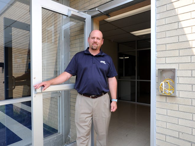 Somerset Superintendant Jeff Schoonover at the new secure entrance at the Somerset Middle School. The box at the right will have a buzzer, camera and proximity card reader to enter. [Herald News Photo\Dave Souza|