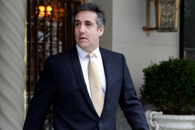 Michael Cohen, former personal lawyer to President Donald Trump, leaves his apartment building, in New York, Tuesday, Aug. 21, 2018. Cohen could be charged before the end of the month with bank fraud in his dealings with the taxi industry and with committing other financial crimes, multiple people familiar with the federal probe said Monday. (AP Photo/Richard Drew)