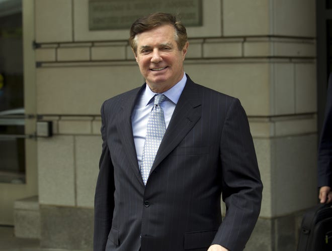 FILE - In this May 23, 2018, file photo, Paul Manafort, President Donald Trump's former campaign chairman, leaves the Federal District Court after a hearing, in Washington. [AP Photo/Jose Luis Magana, File]
