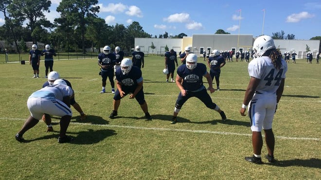 Offensive linemen work on pass blocking schemes during Keiser University’s practice Wednesday, Aug. 15, 2018, in preparation for the season opener Aug. 23. (Rick Robb/The Palm Beach Post)