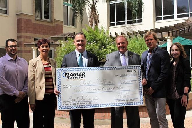Flagler Hospital donated $10,000 earlier this month to Flagler College. The money will be used to kick-off the college's new smoke- and tobacoo-free program. From left: Francesco Manfredi, Flagler Hospital marketing coordinator; Mary Ann Steinberg, program manager for Tobacco Free St. Johns; Jason Barrett, president and CEO of Flagler Hospital; Joseph Joyner Ph.D., president of Flagler College; Eric W. Hoffman, Ph.D., director of the Flagler College Breathe Free campaign, Heather Clark, Breathe Free campaign project coordinator. [Gatehouse Florida/Contributed]