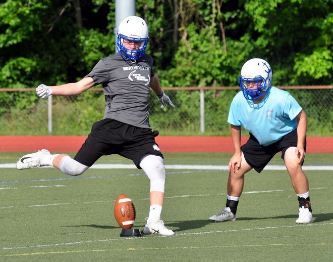 Scituate's Max Roche works on his kicking during return drills at practice Monday August 20 at Scituate High School. The Sailors are looking forward to a big season. [Wicked Local Photo/William Wassersug]