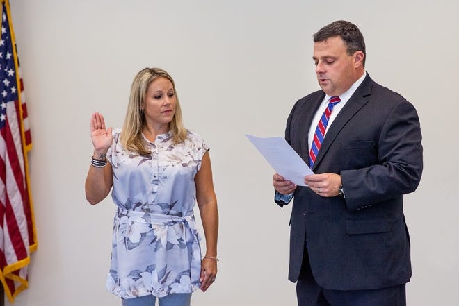 Heather Casparro is sworn in as the new Rowan College at Burlington County Alumni Trustee by Board Solicitor William Burns at the college's Board of Trustees Meeting on Tuesday. [COURTESY OF ROWAN COLLEGE AT BURLINGTON COUNTY]