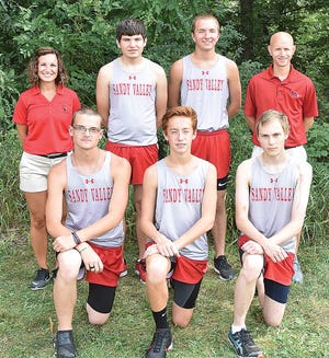 Members of the 2018 Sandy Valley boys cross country team are (front row, left to right) Jordon Finlayson, Nash Monroe and Nick Cappillo; and (back row) Coach Shannon, Nathan Young, Michael Lewton and Head Coach Greg Howard.