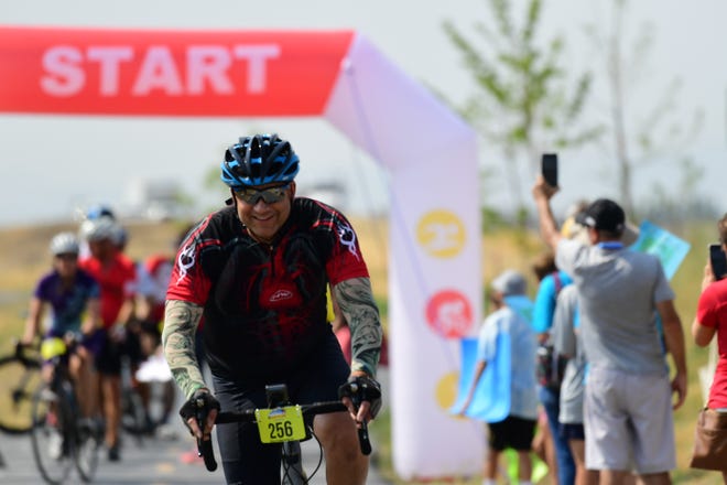 Heart transplant recipient Bill Soloway, of Lower Makefield, rides near the cycling competition starting line during the 2018 Transplant Games of America held in earlier this month in Salt Lake City. [CONTRIBUTED]