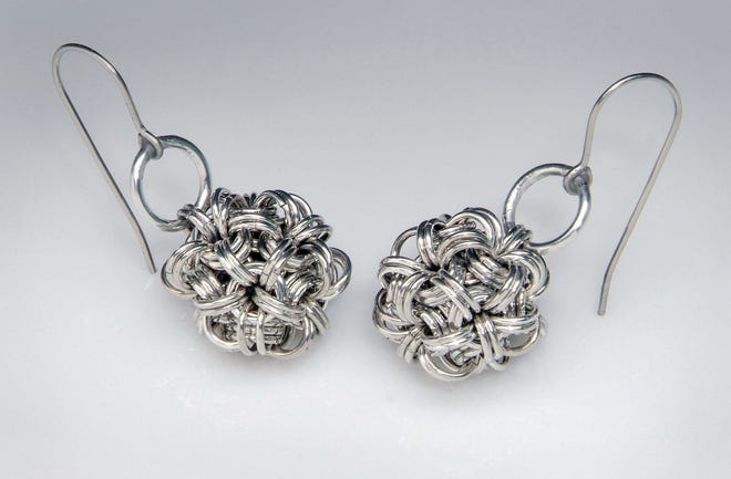 Earrings designed and made by Leslie Halaby-Moore of L.Chain Maille in Boiling Springs. Similar works will be on display at the Pocono State Craft Festival on Saturday and Sunday at Quiet Valley Living Historical Farm in Hamilton Township. [PHOTO PROVIDED]
