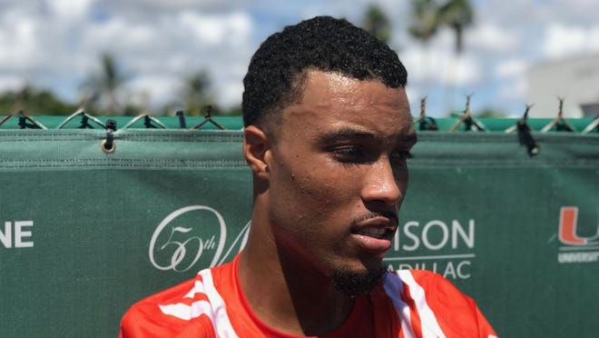 Hurricanes wide receiver Lawrence Cager speaks to the media following Thursday's practice.