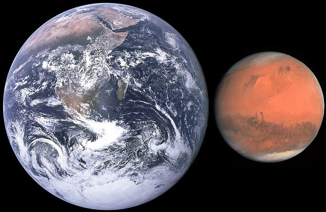 The planets Earth and Mars are shown side by side for comparison. Earth is 7,926 miles wide at the equator; Mars is 4,222 miles wide. [NASA]