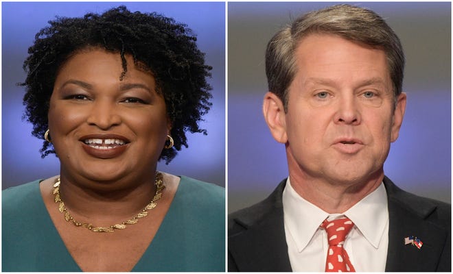 File-This combination of May 20, 2018, file photos shows Georgia gubernatorial candidates Stacey Abrams, left, and Brian Kemp in Atlanta. A predominantly black county in rural Georgia is facing a nationwide backlash over plans to close about 75 percent of its voting locations ahead of the November election. Officials have fired a consultant, Wednesday, Aug. 22, 2018, after widespread opposition erupted over a proposal to close most polling places in a predominantly black Georgia county, the county’s lawyer said Thursday. Randolph County lawyer Tommy Coleman gave The Associated Press a letter he sent Wednesday to consultant Mike Malone ending the contract. (AP Photos/John Amis, File)