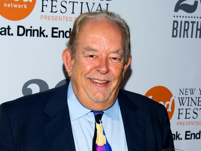 FILE - In this Oct. 17, 2013 file photo, Robin Leach attends the Food Network's 20th birthday party in New York. Leach, whose voice crystalized the opulent 1980s on TV's "Lifestyles of the Rich and Famous," has died, Friday, Aug. 24, 2018. (Photo by Charles Sykes/Invision/AP, File)