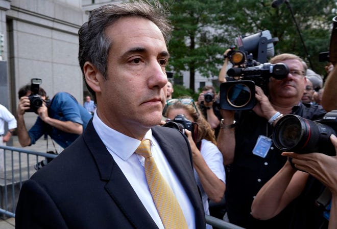 Michael Cohen, former personal lawyer to President Donald Trump, leaves federal court Tuesday after reaching a plea agreement in New York. Allen Weisselberg is the latest Trump confidant, and perhaps the most significant, to strike a deal with federal investigators for protection and to tell what he knows.