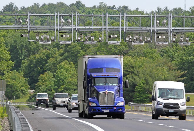 The toll gantries are set up along Interstate 95 in Exeter and Hopkinton. The two locations are the first of 14 planned sites. [The Providence Journal/Steve Szydlowski]
