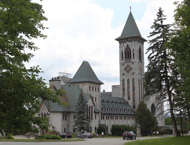 The Benedictine monks of lovely Sainte-Benoit-du-Lac Abbey welcome guests to explore the beautiful structure and buy award-winning cheese and other delectable goodies, Magog, Quebec, Canada. [Steve Stephens]