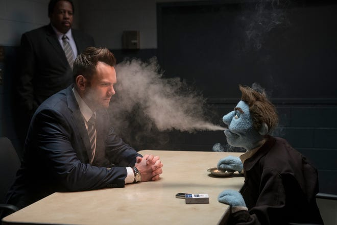 Agent Campbell (Joel McHale) has a rough time questioning Phil Philips (voice of Bill Barretta). [STX]