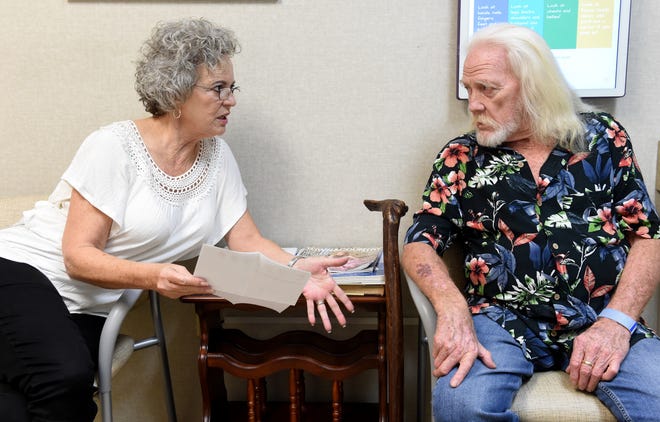 Tina and Jim Black discuss the results of one of his medical test at the Augusta Oncology Associates office in Augusta, Ga., Thursday morning July 12, 2018. Jim Black has had difficulty getting treatment for lung cancer that he says was caused by Agent Orange exposure during the Vietnam War. [MICHAEL HOLAHAN/THE AUGUSTA CHRONICLE]