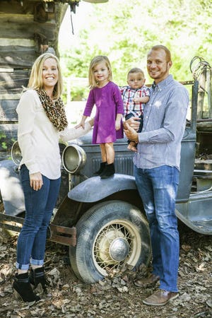 Aaron Whitaker, with his wife and two children, was the founder of Preventia. (Courtesy photo)