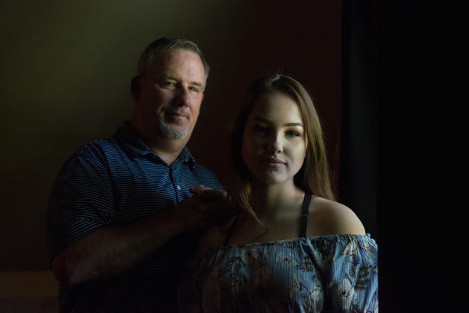 Jeff Dysinger and his daughter, Hannah, pose for a portrait in their Kentucky home. 

Photo for The Washington Post by Brandon Dill