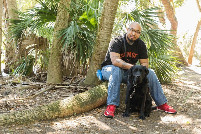 Savannah's Sean Brown received service dog Pella from a charity that gives trained dogs to veterans and people with vision loss. [Submitted photo]
