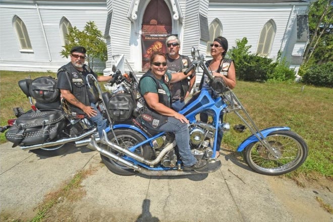 From left, Broken Chains Church Pastor "Flathead" Tom Iddings, Associate Pastor "Chopper Deb" Iddings with "Crazy Dace" Murphy and "Redneck" Maureen Mignault visit the church's new home on Bay Street in Taunton on Aug. 7. [Mike Gay | Taunton Gazette]