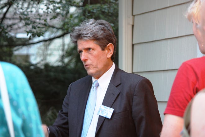 Democratic candidate for governor Bob Massie speaks in Westwood to residents of several towns on Friday, Aug. 24. He talked of the need for improving transportation, alternative energy options, and affordable housing. Wicked Local Staff Photo/Max Bowen