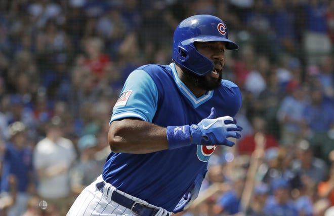 Chicago Cubs outfielder Jason Heyward runs after hitting a one-run triple during the first inning of Sunday's game against the Cincinnati Reds in Chicago. [AP Photo/Nam Y. Huh]