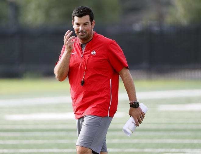 In Urban Meyer's absence, acting coach Ryan Day led preseason Ohio State football practices. [Adam Cairns]