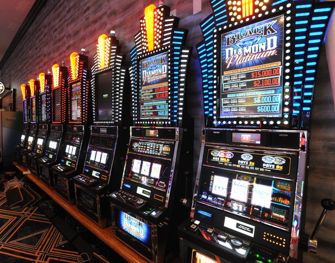 A wall of slots at the new Tiverton Casino and Hotel. Aug 23, 2018 [Herald News Photo | Dave Souza]