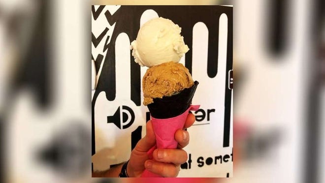 Proper Ice Cream, a cone with a scoop of vanilla and chocolate. (Courtesy of Proper Ice Cream)