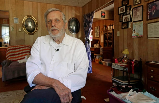 In this photo taken Wednesday, June 6, 2018 civil rights attorney Al McSurely sits for an interview at his home in Carthage, N.C. As the Poor People's Campaign launches a massive initiative to sign up people to support the movement and to vote, its leaders are working with the generation of civil rights activists who stood with the Rev. Martin Luther King and have continued his work. The Rev. William Barber is co-chair of the Poor People's Campaign. He says he turns to those who came before him: leaders such as the Rev. Jesse Jackson, children's advocate Marian Wright Edelman, and attorney Al McSurely. (AP Photo/Gerry Broome)