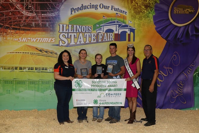 Carroll County 4-H member Rachel Scidmore of Chadwick received a scholarship as one of the top three participants in the 2018 Superior Young Dairy Producer Award program held Aug. 18 at the Illinois State Fair. Pictured, from left: Illinois 4-H Director Lisa Diaz, top three participants Addison Raber, Scidmore and Lane Heinzmann, Miss Illinois County Fair Queen Samantha Hasselbring and Illinois 4-H dairy program coordinator Dave Fischer. [PHOTO PROVIDED]