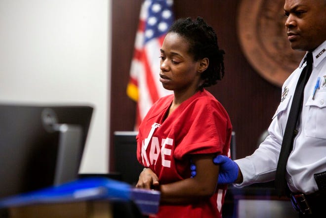 Shakayla Denson, the Tampa mother accused of murder for throwing her 4-year-old daughter, Je'Hyrah Daniels, into the Hillsborough River, during a court appearance.
