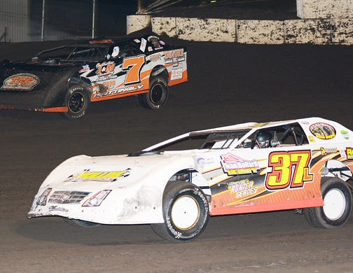 Mikey Ledford (37) tries to hold off Steve Mattingly during sportsman feature action Saturday at Fairbury American Legion Speedway. Mattingly prevailed for the checkered flag on the night he was honored as 2018 sportsman track champion.