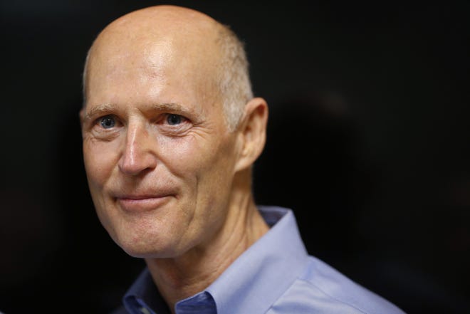 Florida Gov. Rick Scott on Aug. 22 at the Florida Department of Transportation District Four Office in Fort Lauderdale. [AP Photo / Wilfredo Lee]