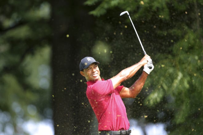 Tiger Woods watches his shot on the sixth hole during the final round of the Northern Trust golf tournament, Sunday, Aug. 26, 2018, in Paramus, N.J. (AP Photo/Mel Evans)