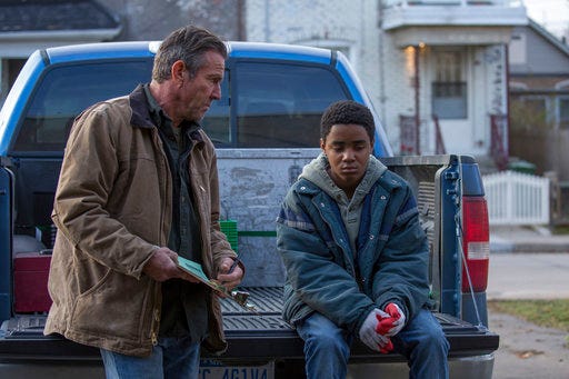 This image released by Lionsgate shows Dennis Quaid, left, and Myles Truitt in a scene from "Kin." (Alan Markfield/Lionsgate via AP)