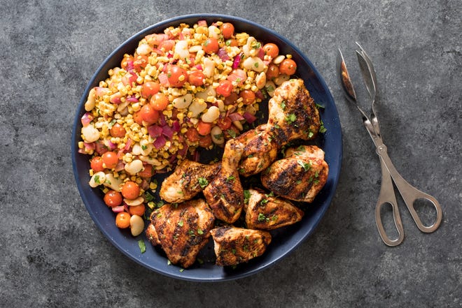 AP Photo — Paprika- and lime-rubbed grilled chicken is made using indirect heat on the grill — "the cool side of the grill."