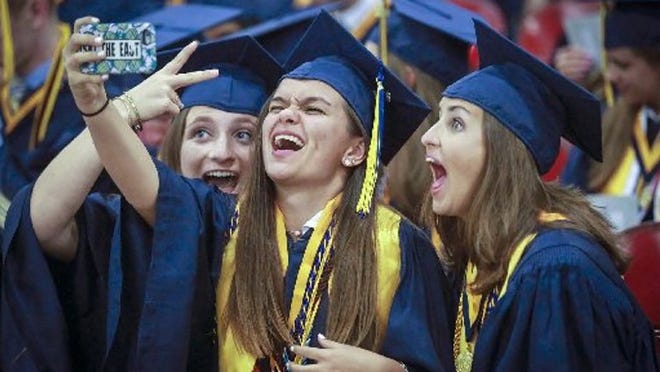 Boca Raton High's popularity pushes boundaries. It is among the most crowded high schools in the district. File photo of graduation 2017. (Bruce R. Bennett / The Palm Beach Post)